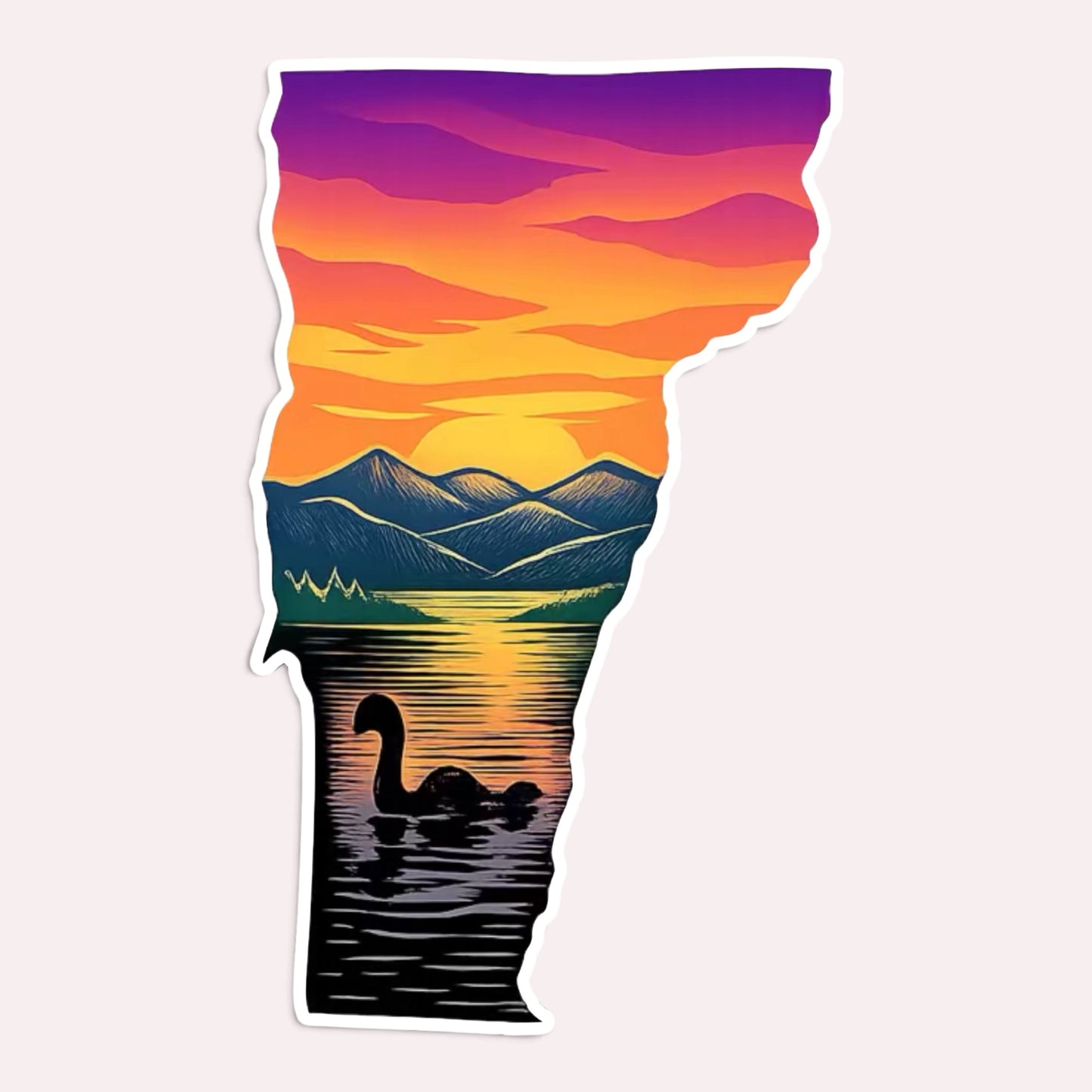 Die-cut sticker shaped like Vermont showing a sunset over Lake Champlain with the Green Mountains and Champ the lake monster