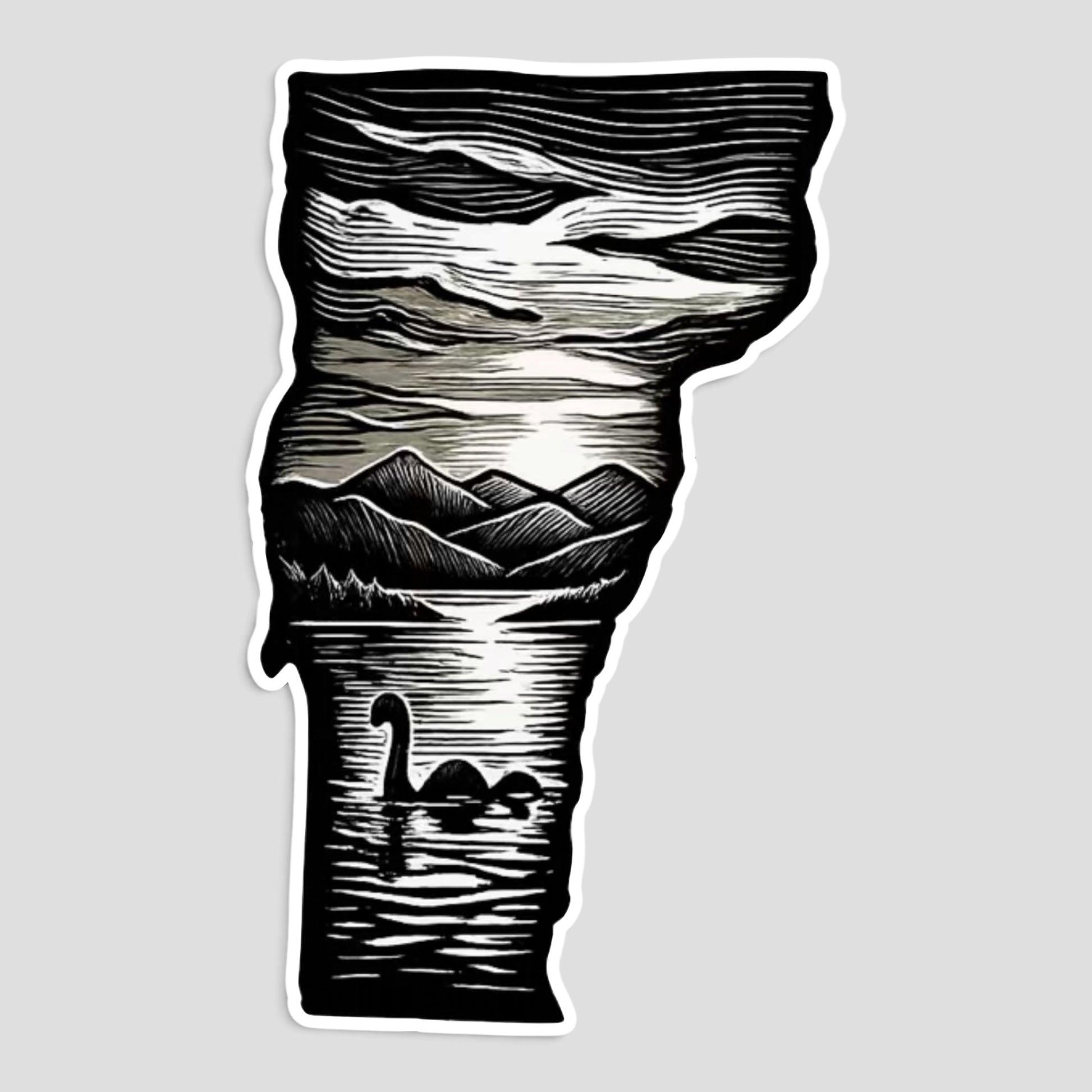 Black-and-white woodcut die-cut sticker shaped like Vermont showing Champ surfacing in a moonlit Lake Champlain